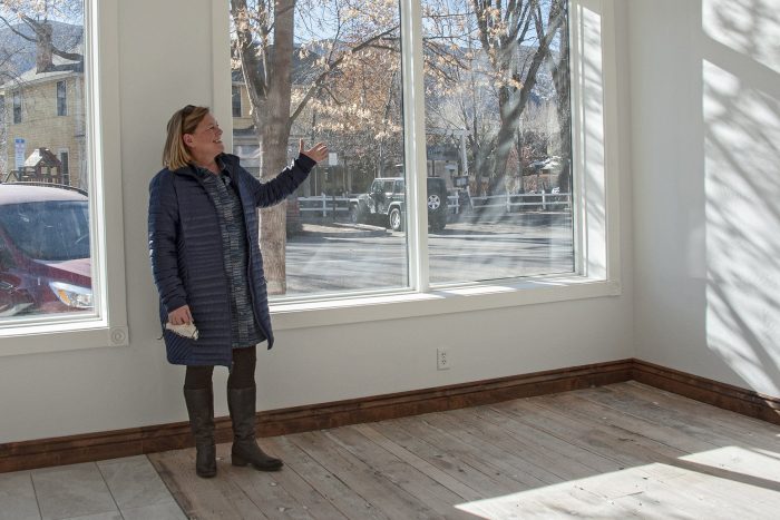 Art Base Executive Director Skye Skinner shows how the large first floor gallery space will be located to attract the interest of people strolling by on Midland Avenue. Photo by Roberta McGowan