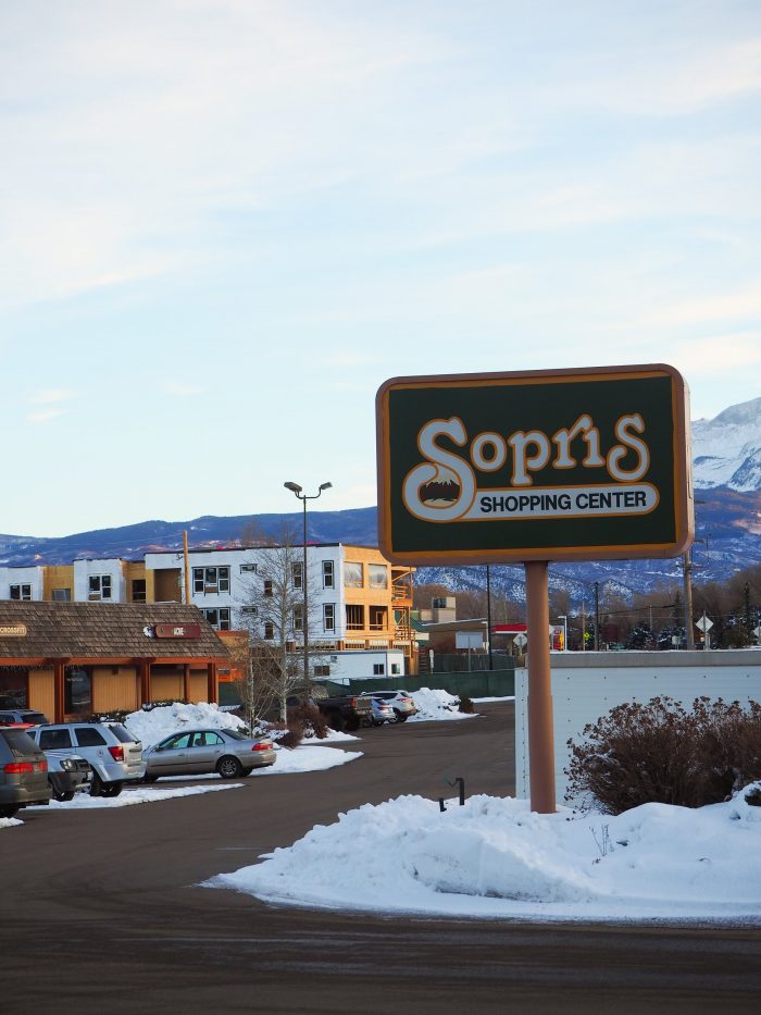BUSINESS COSTS Proposed redevelopment of the Sopris Shopping Center would add 76 new rental units to Carbondale's housing inventory – 15 being deed-restricted and 64 “efficiency” apartments, measuring 415 to 725 square feet. Meanwhile, nine locally-owned businesses see themselves displaced, mid-pandemic. More on page 8. Photo by Raleigh Burleigh.